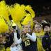Michigan fans wave pom pons as they dance in the stands during a break in the action in the second half against Michigan State at Crisler Center on Sunday, March 3, 2013. Melanie Maxwell I AnnArbor.com